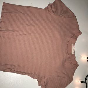 Pink cropped and fitted shirt